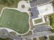 Aerial shot of community amenities including a pool, soccer field, pool, and ample parking at 1972 Wingate Rd, Chamblee, GA 30341