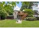 Beautiful backyard featuring a well-maintained lawn and a wooden deck, perfect for outdoor relaxation at 1972 Wingate Rd, Chamblee, GA 30341