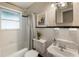 Classic bathroom with white tile, bathtub, and vintage-style sink at 1972 Wingate Rd, Chamblee, GA 30341