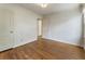 Bright bedroom showcasing hardwood floors and a view leading to a closet at 1972 Wingate Rd, Chamblee, GA 30341