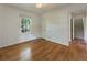 Cozy bedroom with hardwood floors and a view leading to a stairway at 1972 Wingate Rd, Chamblee, GA 30341