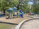 Vibrant community playground with slides, climbing structures, and a sandbox area at 1972 Wingate Rd, Chamblee, GA 30341