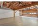 Unfinished basement with exposed ceiling and concrete flooring offers potential for customization at 200 River Pass Trl, Atlanta, GA 30350