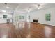Spacious basement with hardwood floors, kitchenette, and walkout to the yard at 200 River Pass Trl, Atlanta, GA 30350