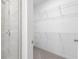 Walk-in shower features glass door and tile surround; also access to closet at 2222 Haventree Ct, Lawrenceville, GA 30043