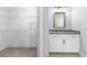 Powder room includes single sink and access to closet at 2222 Haventree Ct, Lawrenceville, GA 30043