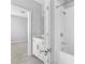 Bathroom with tub and shower combination plus a white vanity at 2222 Haventree Ct, Lawrenceville, GA 30043