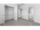 Carpeted bedroom with walk in closet and ensuite bathroom at 2222 Haventree Ct, Lawrenceville, GA 30043