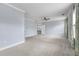 Bright bedroom features neutral walls, carpeted floor, and a ceiling fan at 2222 Haventree Ct, Lawrenceville, GA 30043