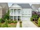 Charming two-story home with a welcoming front porch and well-manicured landscaping at 2222 Haventree Ct, Lawrenceville, GA 30043