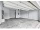 Spacious three car garage, bright lighting, clean concrete floor and ample space at 2222 Haventree Ct, Lawrenceville, GA 30043