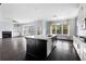 Modern kitchen with a large island, stainless steel appliances, and plenty of cabinet space at 2222 Haventree Ct, Lawrenceville, GA 30043