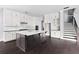 Beautiful kitchen with a large island, granite countertops, and modern stainless steel appliances at 2222 Haventree Ct, Lawrenceville, GA 30043