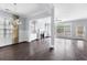 Open concept living space with fireplace and ample natural light at 2222 Haventree Ct, Lawrenceville, GA 30043