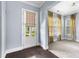 Versatile room with carpet, curtains, and a backyard view at 2222 Haventree Ct, Lawrenceville, GA 30043
