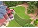 An aerial view displays an expansive backyard, complete with a deck, patio furniture, and landscaping at 3364 Kylee Dawn Cir, Lawrenceville, GA 30045