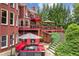 Multi-level backyard with patio, fire pit and extensive landscaping including stairs and retaining walls at 3364 Kylee Dawn Cir, Lawrenceville, GA 30045