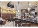 Bar in game room with leather seating at 3364 Kylee Dawn Cir, Lawrenceville, GA 30045