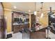 Entertain in style with this elegant bar area, complete with wine storage, and a sleek black countertop at 3364 Kylee Dawn Cir, Lawrenceville, GA 30045