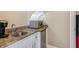 Bathroom wet bar boasts sink, counter, microwave, and small refrigerator at 3364 Kylee Dawn Cir, Lawrenceville, GA 30045