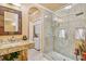 Bright bathroom with large shower and laundry featuring modern fixtures and natural stone accents at 3364 Kylee Dawn Cir, Lawrenceville, GA 30045