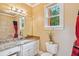 Bathroom featuring granite countertops, tiled shower with shower curtain, and large mirror at 3364 Kylee Dawn Cir, Lawrenceville, GA 30045