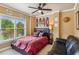 Comfortable bedroom with great window light and cozy seating area at 3364 Kylee Dawn Cir, Lawrenceville, GA 30045