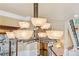 Unique dining room chandelier with contemporary design and soft, ambient lighting at 3364 Kylee Dawn Cir, Lawrenceville, GA 30045