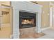 Fireplace with ceramic tile and white mantle at 3364 Kylee Dawn Cir, Lawrenceville, GA 30045