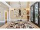 Stylish foyer with marble floors, columns, elegant decor, and a view of the upper level at 3364 Kylee Dawn Cir, Lawrenceville, GA 30045