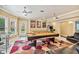 Spacious game room with pool table and air hockey at 3364 Kylee Dawn Cir, Lawrenceville, GA 30045