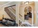 Comfortable basement area with a staircase and bar at 3364 Kylee Dawn Cir, Lawrenceville, GA 30045