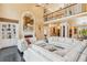 Open living room with fireplace, second floor balcony, and comfortable furniture at 3364 Kylee Dawn Cir, Lawrenceville, GA 30045