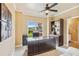 Home office featuring a large desk, bookcase, and natural light at 3364 Kylee Dawn Cir, Lawrenceville, GA 30045