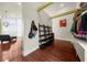 Walk-in closet and dressing area with modern shelving and hardwood floors at 4940 Sunrise Ln, Cumming, GA 30041