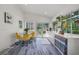 Bright dining area with seating, natural light, and access to the outdoors at 4940 Sunrise Ln, Cumming, GA 30041