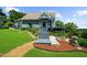 Charming home with well-manicured lawn and landscaping, leading to a cozy and inviting entrance at 4940 Sunrise Ln, Cumming, GA 30041