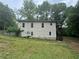 Back view of home showing the yard at 1889 Browns Mill Se Rd, Atlanta, GA 30315