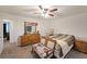 Large bedroom with natural lighting, neutral paint, and soft carpet flooring for comfort at 37 Faithful Dr, Temple, GA 30179