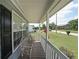 Cozy front porch with rocking chairs, offering a relaxing outdoor space with charming details at 37 Faithful Dr, Temple, GA 30179