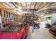 Spacious garage with an exposed ceiling, filled with recreational vehicles and tools for any hobby at 37 Faithful Dr, Temple, GA 30179