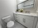 Beautiful bathroom featuring white marble floors and white vanity at 5685 Kingsport Dr, Sandy Springs, GA 30342