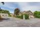Elegant home with multiple garages and lush landscaping providing curb appeal at 3898 Bay Creek Rd, Loganville, GA 30052