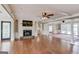 Spacious living room with fireplace, hardwood floors, and open layout at 3898 Bay Creek Rd, Loganville, GA 30052