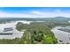 Beautiful aerial shot of the lake, showcasing wooded areas and multiple docks at 5400 Kings Camp Rd Se #C1 Se Rd, Acworth, GA 30102