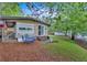 Charming home with a covered porch, outdoor seating, and well-maintained lawn and landscaping at 5400 Kings Camp Rd Se #C1 Se Rd, Acworth, GA 30102