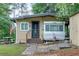 Charming home with a covered camper, an American flag and front yard at 5400 Kings Camp Rd Se #C1 Se Rd, Acworth, GA 30102
