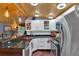 Well-lit corner kitchen with granite countertops and stainless steel appliances at 5400 Kings Camp Rd Se #C1 Se Rd, Acworth, GA 30102