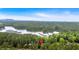 Picturesque lake view surrounded by lush forests, perfect for nature lovers at 5400 Kings Camp Rd Se #C1 Se Rd, Acworth, GA 30102