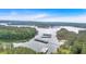 Breathtaking view of a lake dotted with boat docks and surrounded by lush, green forests at 5400 Kings Camp Rd Se #C1 Se Rd, Acworth, GA 30102